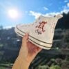 Zapatillas comunión caña alta personalizadas blanca botin con dibujo niña nombre sofia y fecha.